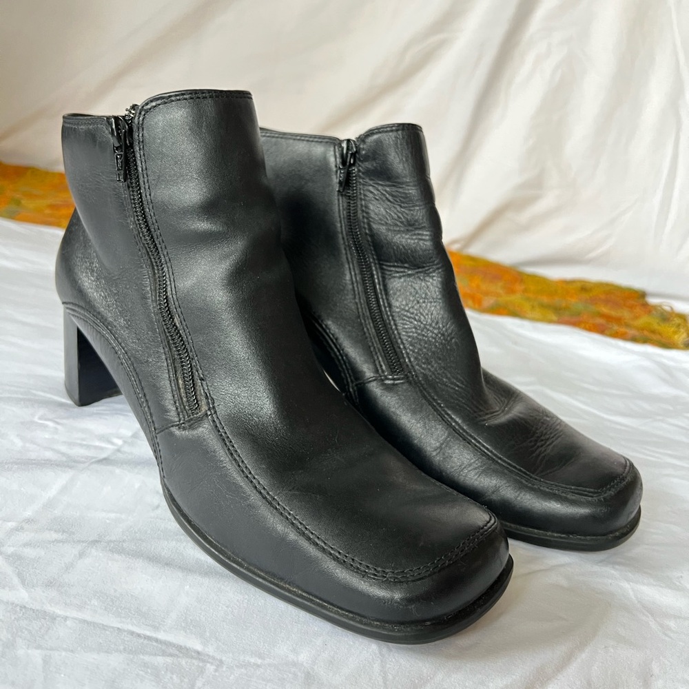 Vintage black leather ankle boots with small heel and zipper closure